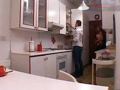 Shemale sex in a kitchen
